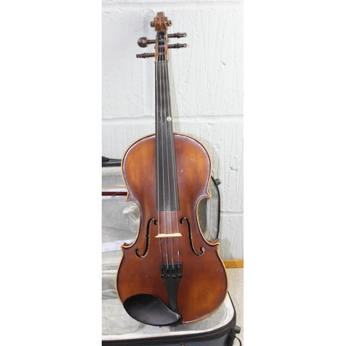 653 - Violin in modern case, one piece back, partial label for Giovanni, with bow