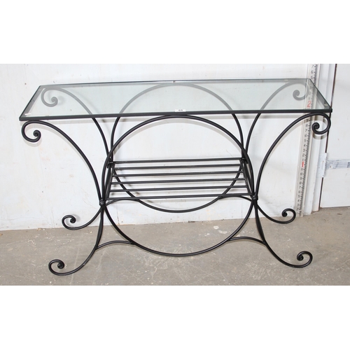 69 - A wrought iron and glass topped hall table