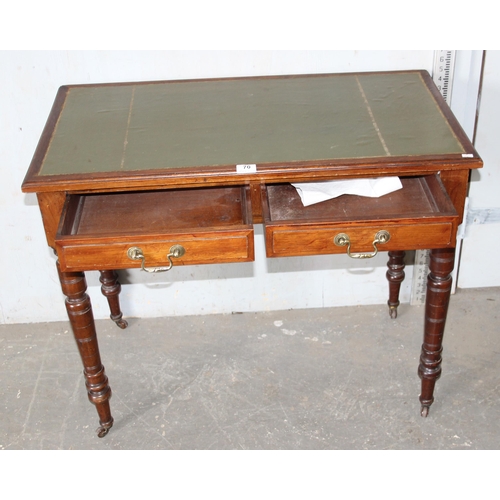 70 - Antique desk with green leather top and castors