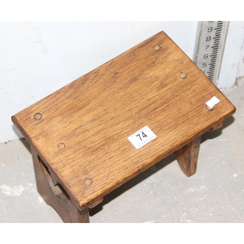 74 - A small wooden milking stool with heart pierced carving