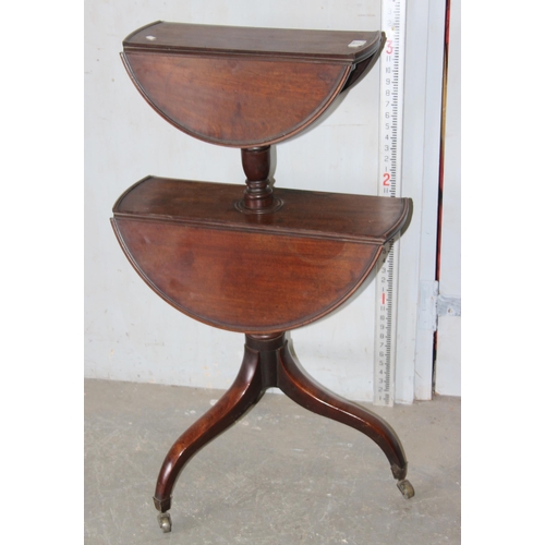 78 - An unusual 2 tier dumb waiter type table with drop flaps