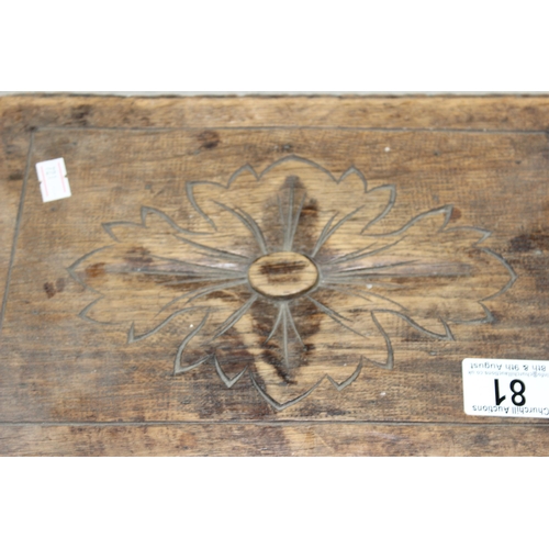 81 - A small antique carved oak stool