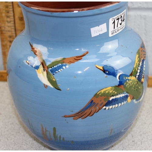 1734 - A large Dartmouth art pottery vase decorated with flying ducks