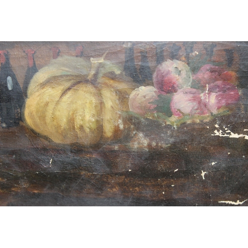 406 - An antique oil on canvas of a lady arranging flowers, unsigned, late 19th or early 20th century, rem... 