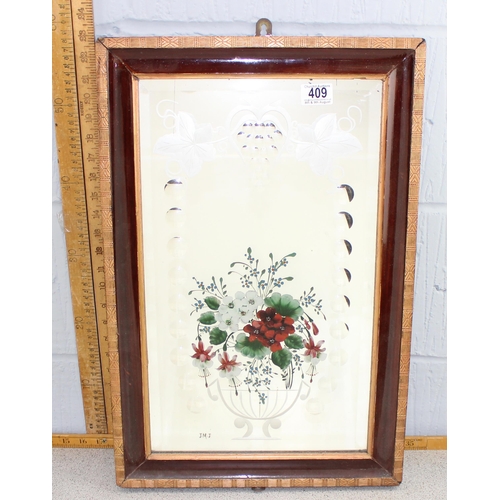 409 - A vintage wooden framed mirror with painted and engraved floral decoration