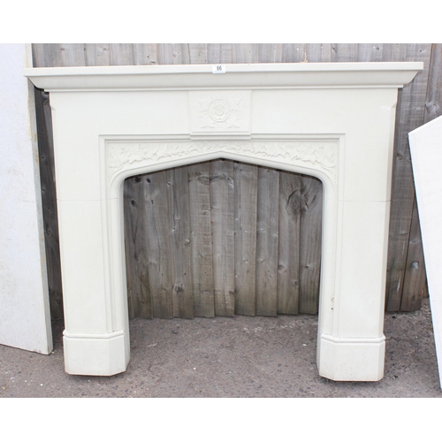 86 - A marble effect fire surround with marble back and top