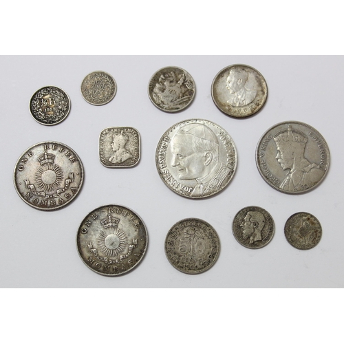 1319 - Quantity of silver and white metal world coins to include Ceylon 5 cents 1912 and one rupee Mombasa,... 