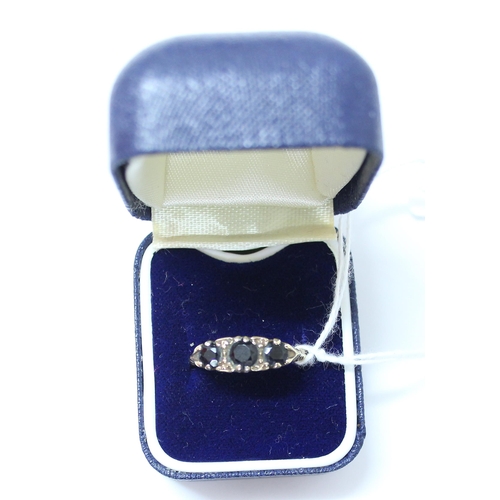 1218 - 9ct gold 3 stone sapphire ring, approx size P & 3.3g gross