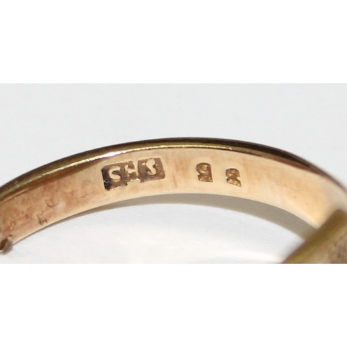 1219 - 9ct gold signet ring with engraved design and small diamond, approx size T & 4.7g gross