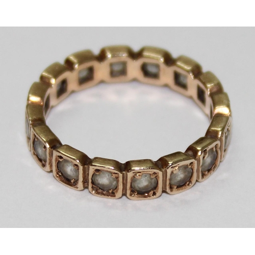 1222 - 9ct gold and white stone eternity ring, approx size M & 3g gross