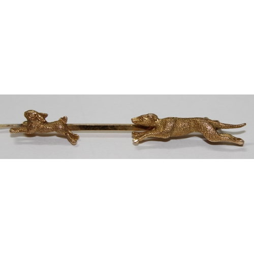 1225 - 9ct gold hunting bar brooch, dog possibly a Greyhound chasing a hare, boxed, approx 5.7g gross