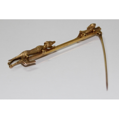 1225 - 9ct gold hunting bar brooch, dog possibly a Greyhound chasing a hare, boxed, approx 5.7g gross