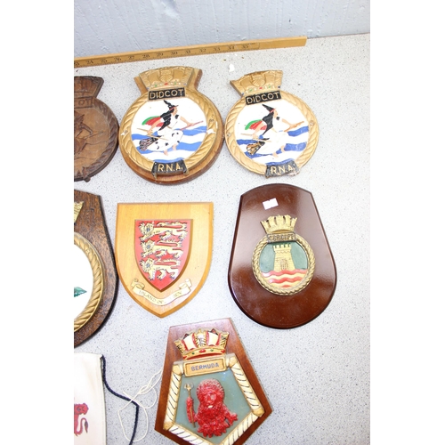 1013 - 10 vintage military wooden plaques, mainly plaster on wooden shields etc etc