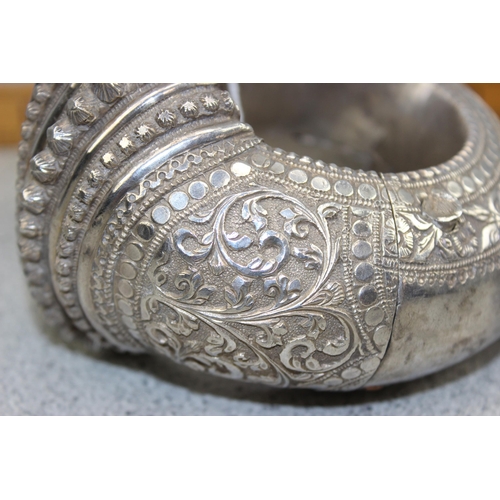 1126 - 2 Indian or Omani white metal (likely silver but unmarked) bangles or anklets with engraved decorati... 