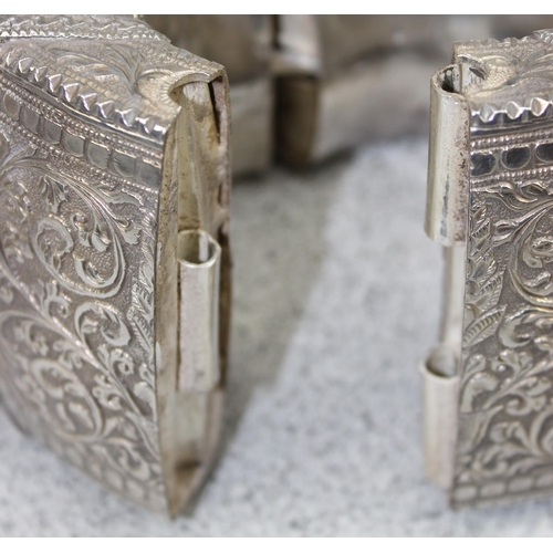 1126 - 2 Indian or Omani white metal (likely silver but unmarked) bangles or anklets with engraved decorati... 