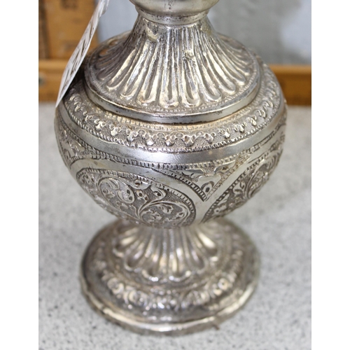 1127 - An Indian white metal (likely silver but unmarked) Rosewater sprinkler or dropper with embossed desi... 