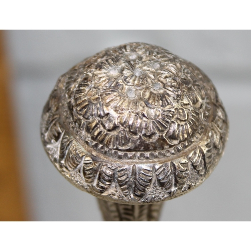 1127 - An Indian white metal (likely silver but unmarked) Rosewater sprinkler or dropper with embossed desi... 