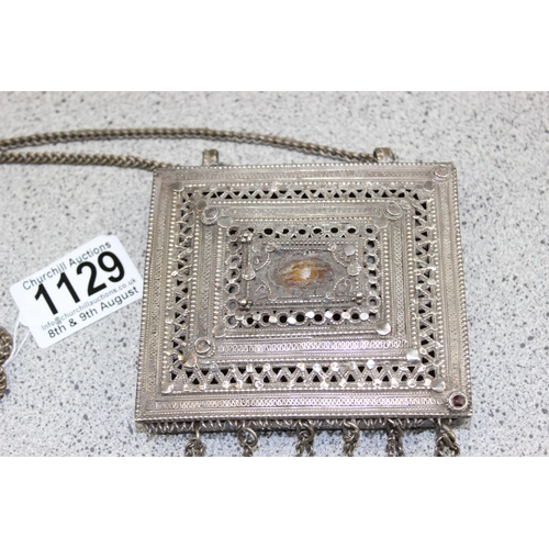 1129 - An unusual white metal (likely silver but unmarked) amulet box necklace, possibly Omani in origin, l... 