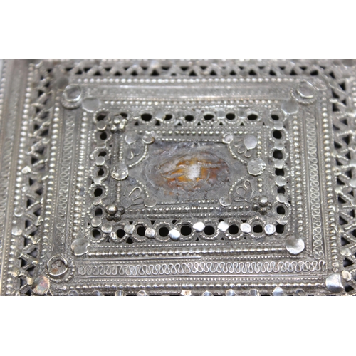 1129 - An unusual white metal (likely silver but unmarked) amulet box necklace, possibly Omani in origin, l... 