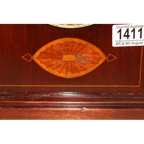 1411 - An Edwardian Lancet shaped clock with Ansonia movement, key and pendulum, the case with Sheraton sty... 