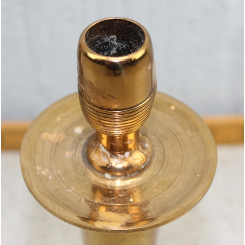 1611 - A pair of heavy brass candlesticks