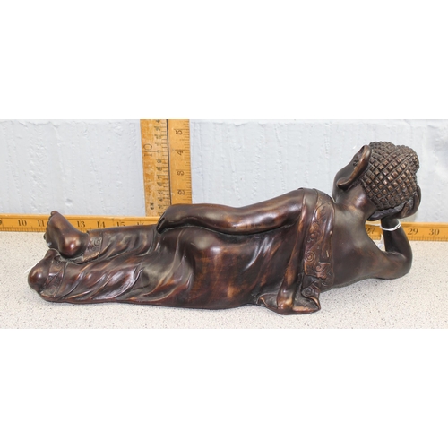 1742 - A modern bronzed reclining Buddhist deity