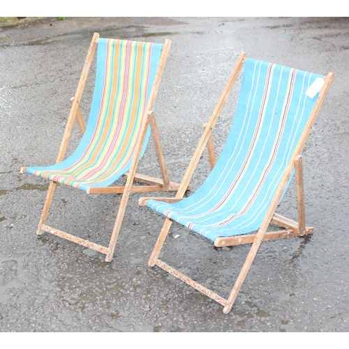 343 - 2 vintage folding wooden framed deck chairs