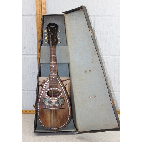 662 - Antique 8 string Mandolin by Francesco Salamone of Napoli with butterfly inlay, in case