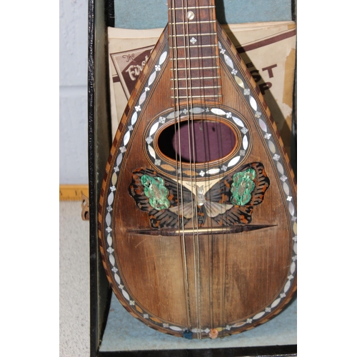 662 - Antique 8 string Mandolin by Francesco Salamone of Napoli with butterfly inlay, in case