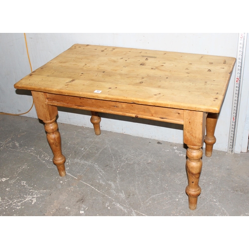 93 - A vintage pine farmhouse kitchen table, approx 125cm x 75cm