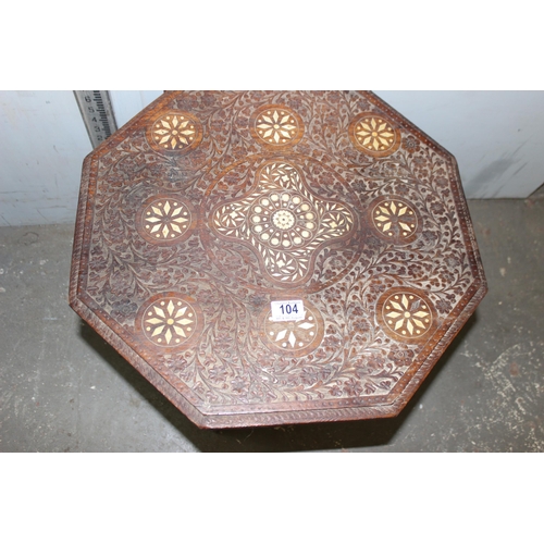 104 - A vintage Indian carved folding hardwood tea table