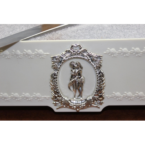 1797 - A vintage wedding cake display stand in wooden box and a cake knife