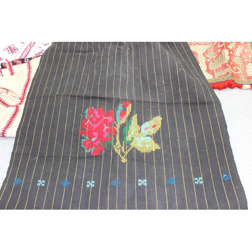 210 - 4 Bulgarian blouses, 2 Bulgarian apron panels, embroidered kerchief, some with heavy embroidery