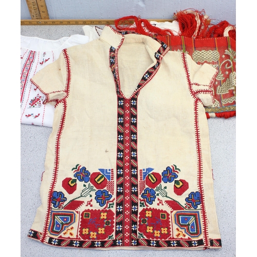 210 - 4 Bulgarian blouses, 2 Bulgarian apron panels, embroidered kerchief, some with heavy embroidery