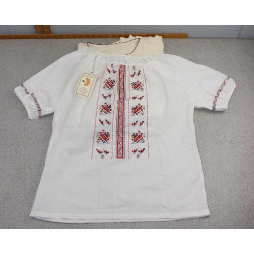 210 - 4 Bulgarian blouses, 2 Bulgarian apron panels, embroidered kerchief, some with heavy embroidery