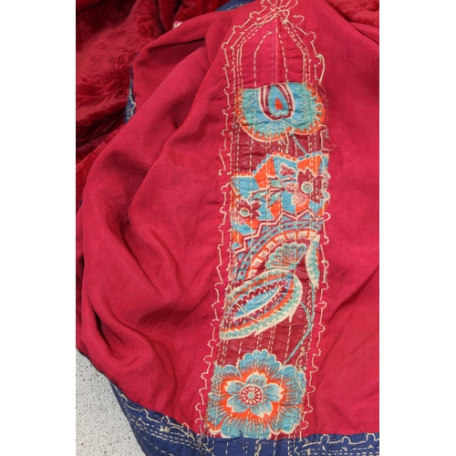 213 - An antique red velvet dress with heavy gold thread embroidery, possibly Turkish