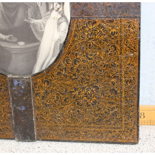 456 - An antique Liberty style Kashmiri frame with religious print