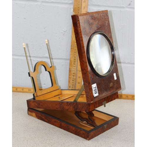 709 - A late Victorian walnut magnifier or viewer with 5 inch magnifier and folding adjustable stand