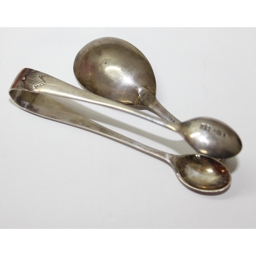 1118 - An early 19th century silver caddy spoon with bright cut decoration, marks rubbed, and a pair of sug... 