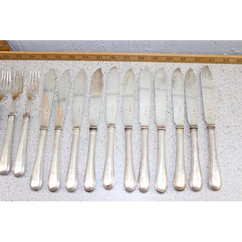 1153 - A qty of silver fish knives and forks, with silver filled handles and silver blades, Sheffield 1881 ... 