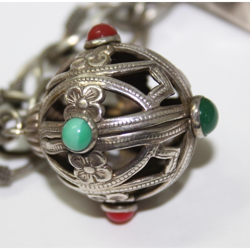 1236 - An Italian white metal charm bracelet, marked Italy, no silver marks