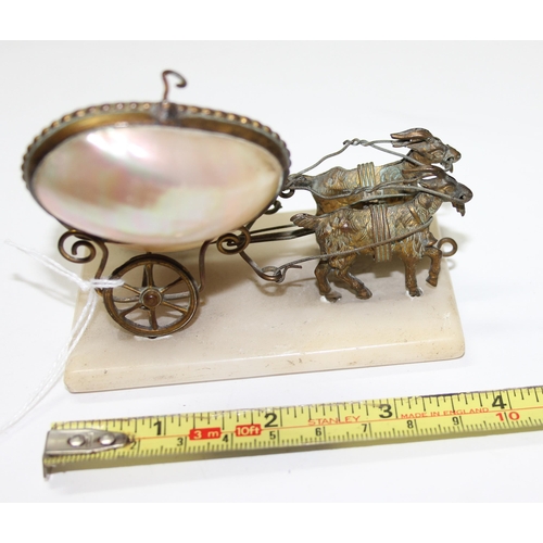 1627 - An unusual Palais Royale antique gilt metal and mother of pearl model of a pair of goats pulling a c... 