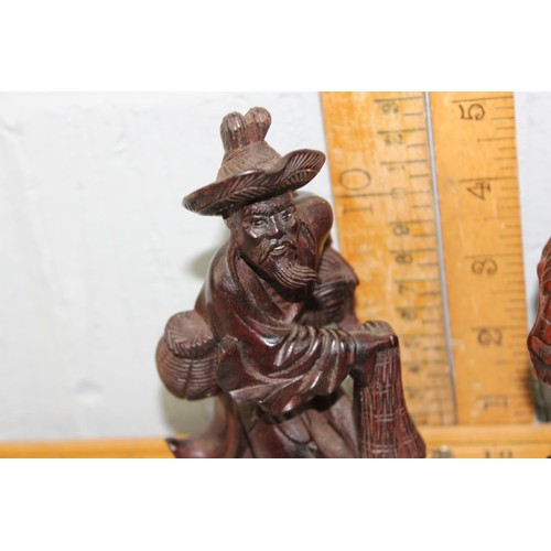 1671 - 2 Oriental carved wooden male figures, likely 20th century