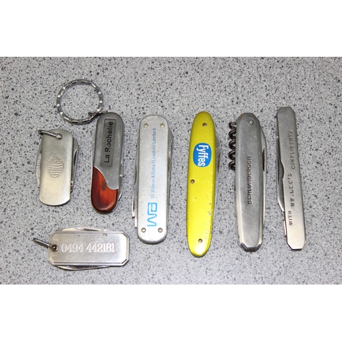 1041 - 7 assorted advertising penknives to inc Fyffes bananas and Schlumberger