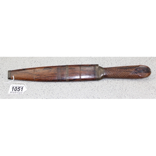 1051 - A c.WW2 period clip point knife in wooden sheath, believed to be North African