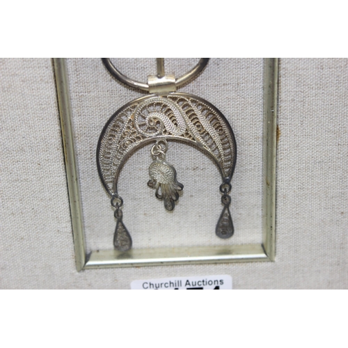 1171 - A Yemen white metal filigree item in frame, likely silver and a Cypriot Lefkara lace embroidery pane... 