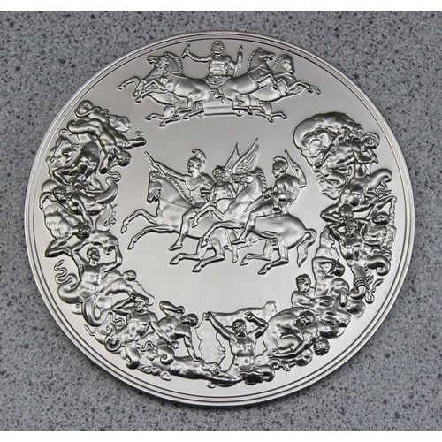 1351 - A large antique style table medallion cast with various classical scenes of heads and chariot racing... 