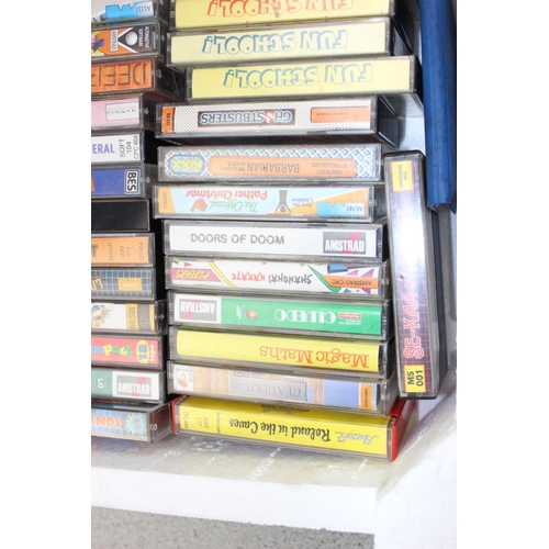 1547 - A large qty of vintage computer games cassettes, mainly Spectrum & Amstrad etc