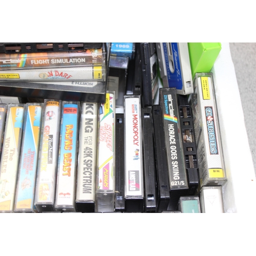 1547 - A large qty of vintage computer games cassettes, mainly Spectrum & Amstrad etc