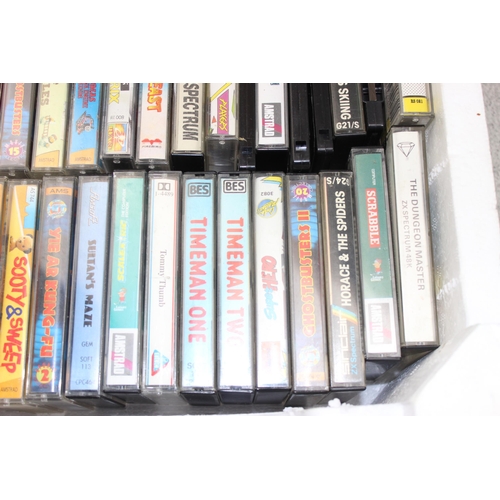 1547 - A large qty of vintage computer games cassettes, mainly Spectrum & Amstrad etc